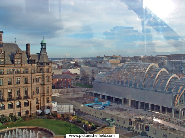 Elevated view of the Town Hall Winter Garden and Peace Garden from the Big Wheel Pinstone Street