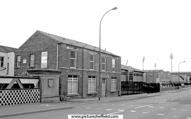 Newhall Road Bridge (left) and former Lodge Inn, No. 143 Newhall Road looking towards Attercliffe with the floodlights from Don Valley Stadium in the background