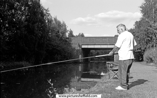 Alan Bradley fishing in the Canal (Sheffield and South Yorkshire Navigation) near Pothouse Bridge, Coleridge Road