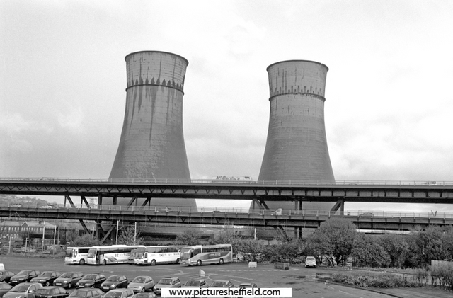 Cooling Towers and Tinsley Viaduct with Meadowhall Shopping Centre Coach Park in the foreground