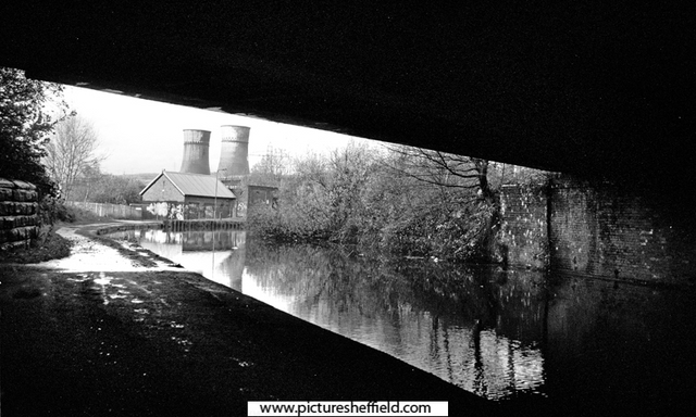 View of SYK Navigation from under Sheffield Road Bridge (Tinsley Bridge) looking towards the former Pump House, Tinsley Viaduct and Cooling Towers