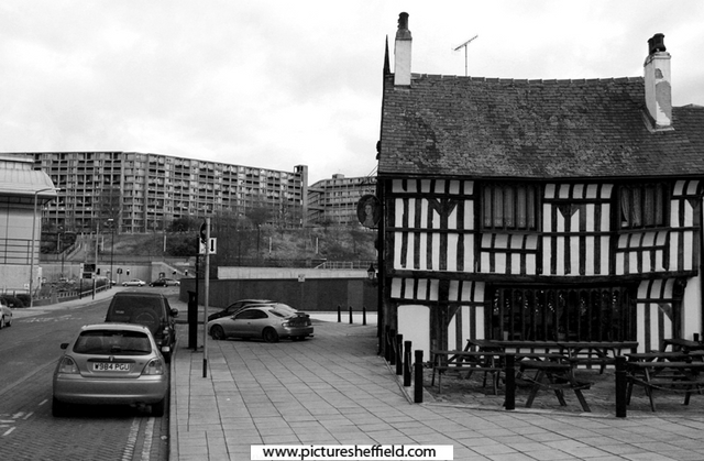The Old Queens Head public house, No. 40 Pond Hill with Park Hill Flats in the background