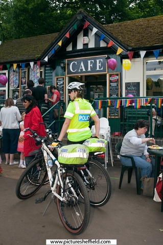 A Policewoman outside the cafe in Endcliffe Park during Gay Pride Festival