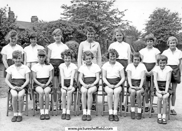 Hatfield House Lane J. and I. School, 1962 Rounders team, Winners of the Eaton Cup, team comprised of J3 and J4 Girls, taken at the front of school