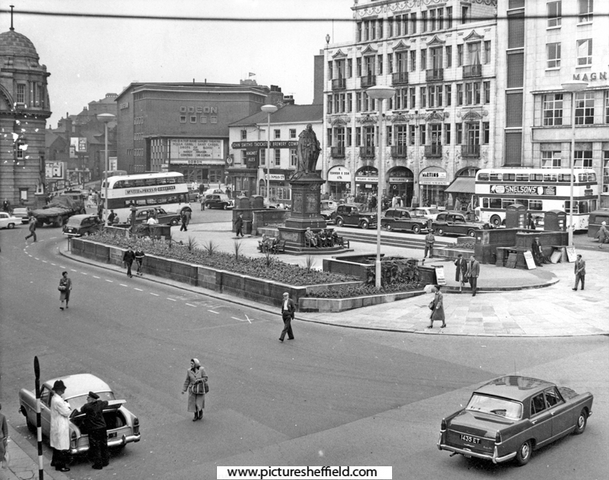 Fitzalan Square looking towards (l. to r.) Odeon Cinema, Elephant Inn (corner of Norfolk Street), John Smith's Tadcaster Brewery Co. Ltd., offices, The White Building and Marples Hotel. King Edward VII Memorial, foreground