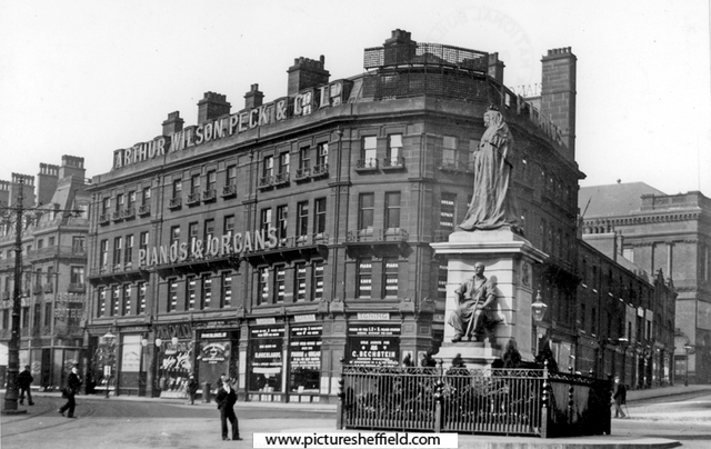 Town Hall Square and and Queen Victoria Memorial, looking towards Pinstone Street and Barkers Pool. Nos 2-6, Pinstone Street, Wilson Peck Ltd., Music Sellers, in background
