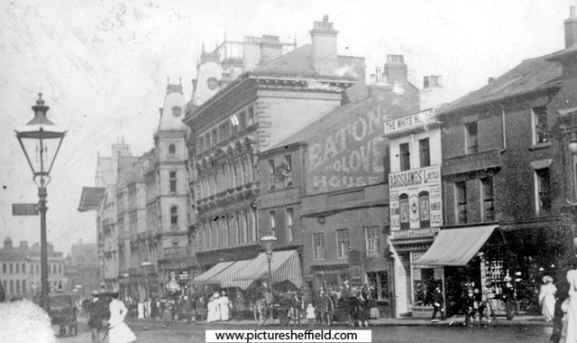 Fargate, shops include Nos. 19 - 23 Independent Offices, Fargate House, Nos. 25 - 31 Victoria House, No. 33 John B. Eaton, hosier, No. 35 Old Red House Inn
