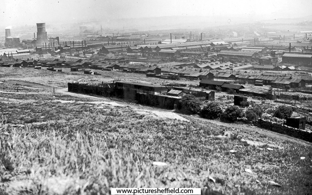 Industrial Lower Don Valley viewed from Wincobank Hill overlooking Tyler Street Munition Huts across to Hadfields East Hecla Works and the Water Cooling Tower of the Electric Power Station