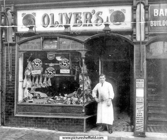 Alfred Oliver at the door of Oliver Brothers butchers shop, No. 14 Staniforth Road. (Arnold Callis, estate agent in Bank Buildings adjoining)