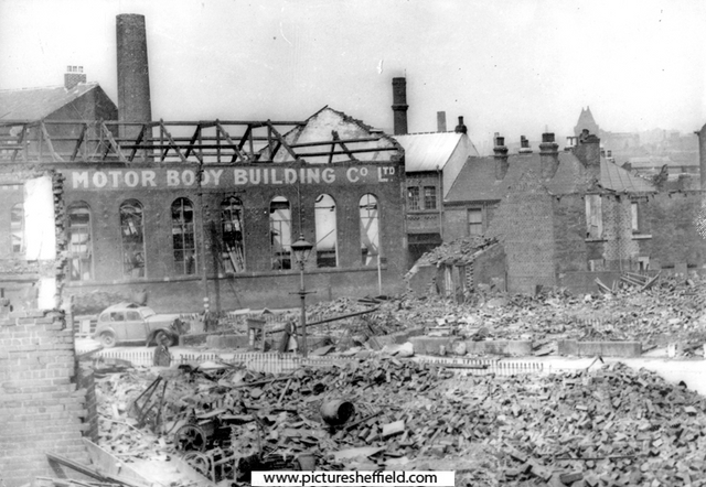 Forncett Street showing air raid damage to Motor Body Building Co. Ltd.