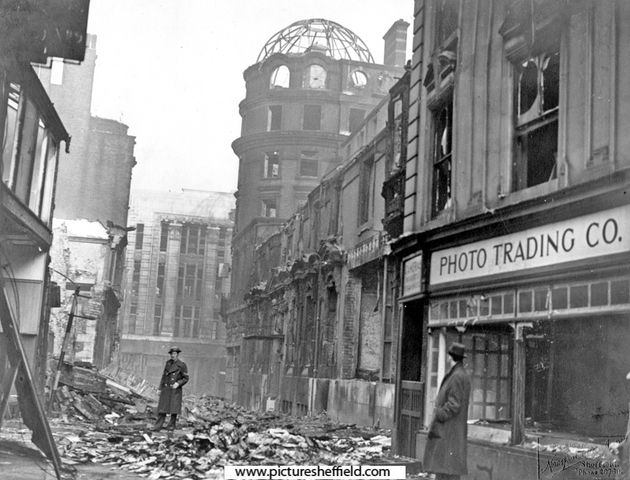 Change Alley, showing air raid damage, King's Head Hotel on right