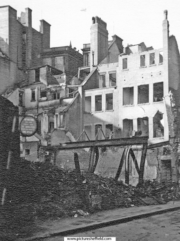 Site of E. Weston and Co., newsagents, Change Alley, showing air raid damage