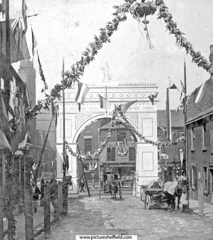 Queen Victoria's visit. Decorative arch at junction of Broad Street and South Street, Park, photographed from South Street looking towards Broad Street, premises in background include Broad Street Cafe