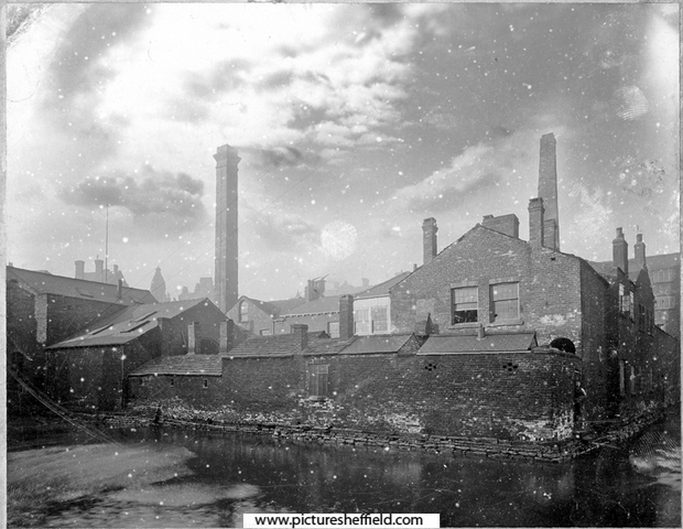 Marsh Brothers, steel manufacturers, Pond Works, (fronting Shude Lane), right, William Jessop's Soho Rolling Mills, left (includes square chimney). Ponds Dam, foreground (fed by River Sheaf)