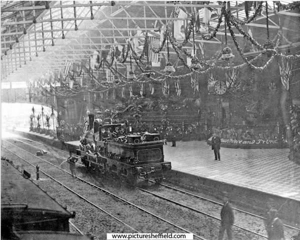 Victoria Station, decorated for the visit of Prince and Princess of Wales (Edward and Alexandra) on midday 16th August 1875 to open Firth Park