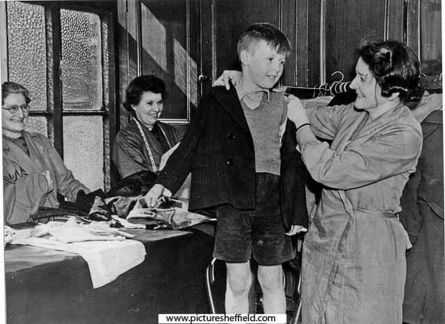 WVS organised clothing exchange for children at No. 47 Arundel Street during WWII