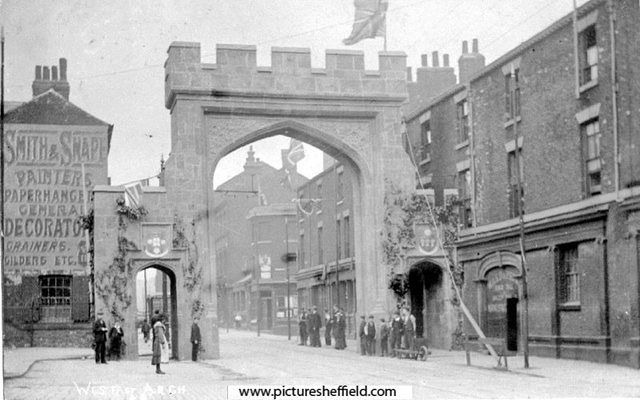 Decorative arch on West Street for the royal visit of King Edward VII and Queen Alexandra showing (right) Nos. 112 - 114 Ward and Payne, tool manufacturers