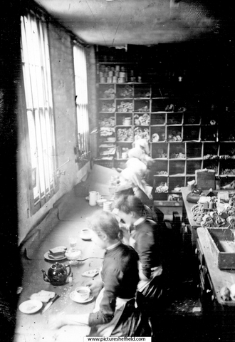 Tea break at an unnamed cutlery workshop, possibly producing penknives. Possibly William J. Wards or Joseph Rogers, near Midland Station
