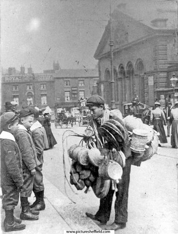 Basket seller, Haymarket, Norfolk Market Hall (prior to the rebuilding of the west front 1904-5) and Royal Hotel in background
