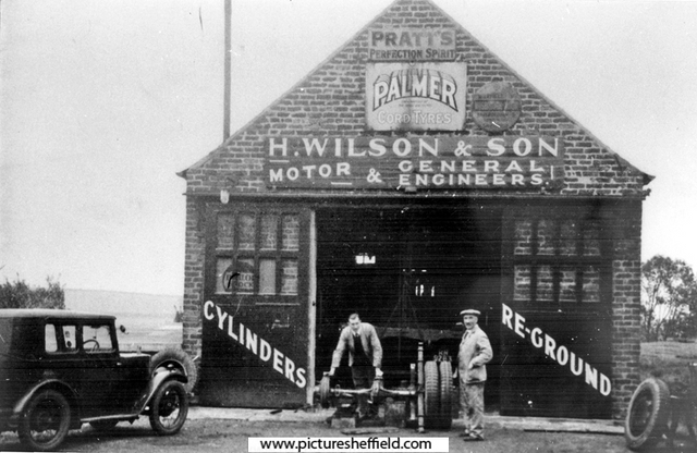 Horace Wilson and Son, Motor and General Engineers, Mosborough Moor, Mosborough. The building was formerly Moorhole Colliery Winding House. Horace Wilson (right) and Ernest, his son on left.