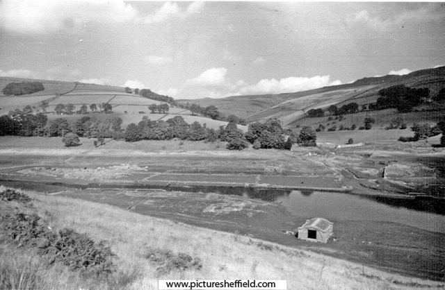 Ruins of Derwent Village, Ladybower Reservoir, revealed by the drought of 1949, Derwent Hall, left 	