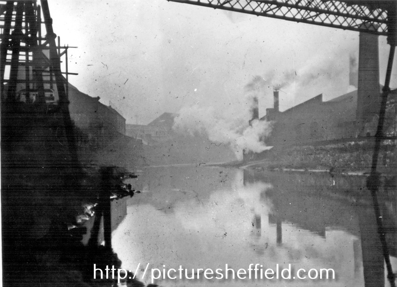View of the River Don, looking west towards Park Iron Works, Foley Street on the left and centre of the photograph with Crescent Steelworks, Warren Street on the right. 