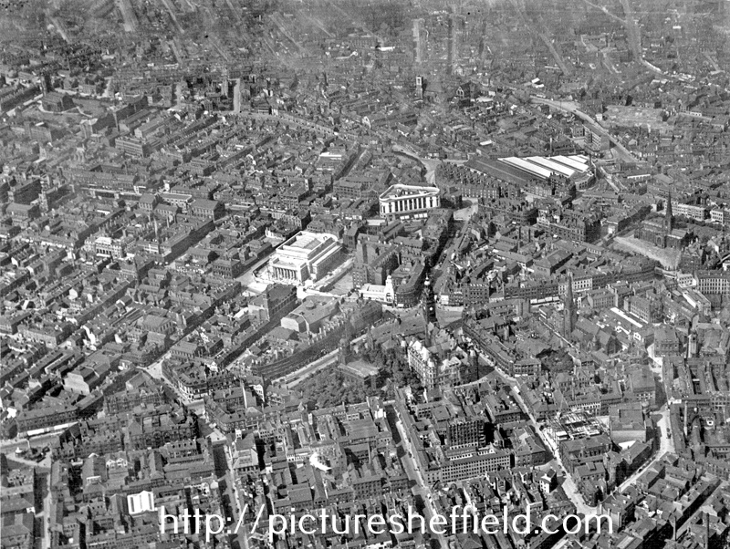 Aerial view - City Centre, including Town Hall and St. Paul's Church, Pinstone Street, City Hall (under construction), Barker's Pool, Central Telephone Exchange, West Street and Leopold Street, note construction of Central Library, Surrey Street