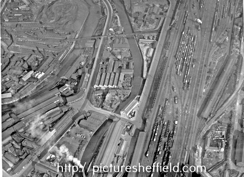 Aerial view - Roads including Effingham Road, Foley Street and Bernard Road, Park Iron Works, Norfolk Bridge Works, River Don, SYK Navigation and L.M.S. Railway