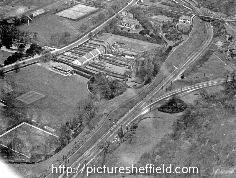 Aerial view - Abbeydale Road South and Twentywell Lane and Railway Tracks, St. John's Church and Dore and Totley Station can be seen in background