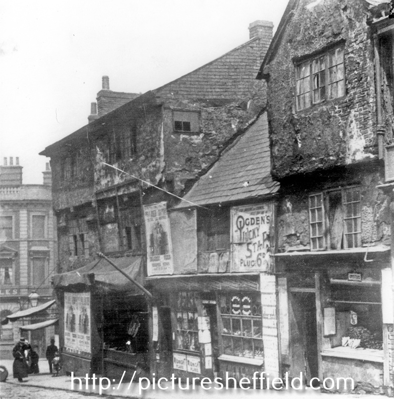 Snig Hill, left-right, No. 74 Howard Brothers, butchers; No. 72 hairdressers and tobacconist belonging to Joe Turner, No. 70 oyster dealer belonging to Harry Fox, Pack Horse Inn, West Bar, extreme left