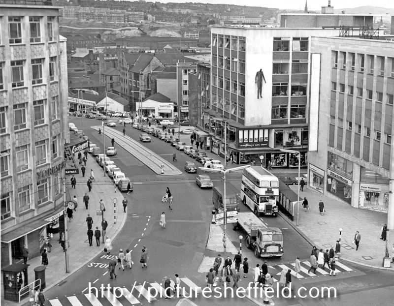 Elevated view of Angel Street and Market Place, Nos. 51 - 57 Peter Robinson Ltd., department store and Hornes, tailors with (right) the Vulcan Sculpture by Boris Tietze