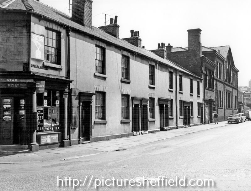 Mrs. M. Clay's corner shop No. 57 Russell Street, Bowling Green Street looking towards Moorfields showing Sheffield College of Technology, Department of Science and Metallurgy, Lancastrian Annex, extreme right (former Lancasterian School)