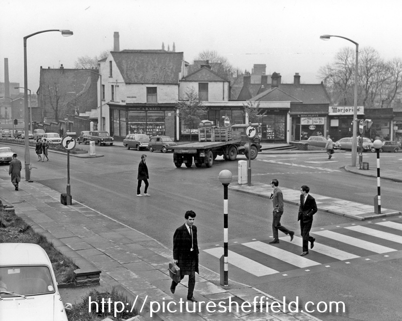 Brook Hill at the junction with Leavygreave/Hounsfield Road, showing Alan B. Ward's, bookseller, L. Hinchliffe, hairdresser and Marjorie's cafe