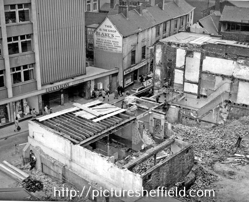 Elevated view of Change Alley showing demolition of buildings, Yorkshire Electricity Board (Sheffield Area H.Q.) on left 	