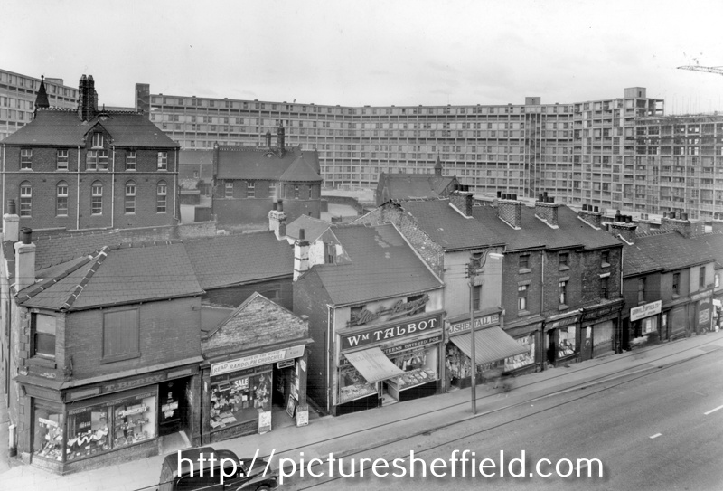 Park Hill Flats and Nos. 122 - 96 Duke Street, No. 122 Thomas Berry, chemist; No. 120 Percy Lee, newsagent; Nos. 114 - 116 William Talbot, butcher; No. 112 John Shentall Ltd., grocers and Park Elementary Schools in background