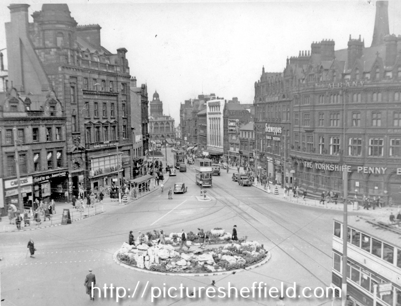 Elevated view of Town Hall Square looking towards Fargate, Town Hall Square rockery, foreground, No. 66 Fleur de Lys public house and Bank Chambers, left, Carmel House, Albany Hotel and Yorkshire Penny Bank, right
