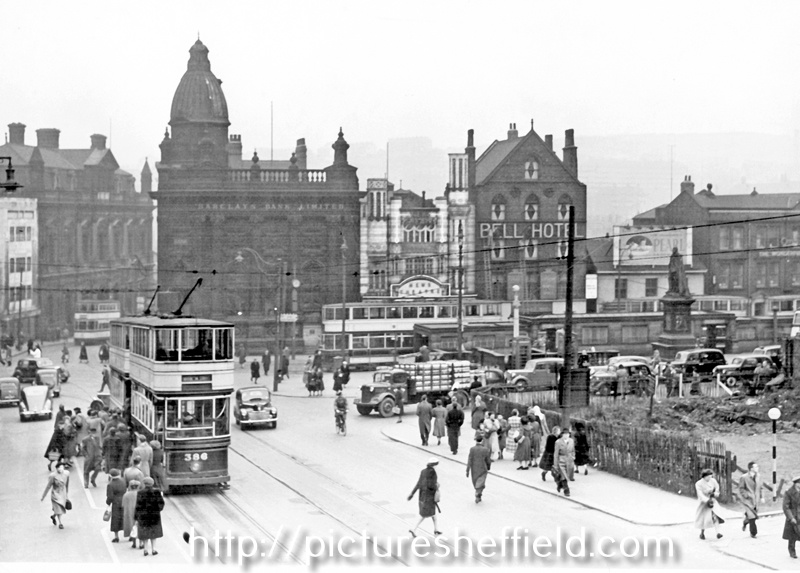 High Street/Fitzalan Square towards Commercial Street and Gas Company Offices, premises include (left-right), Barclays Bank, News Theatre (former Electra Palace) and Bell Hotel, undeveloped site in foreground was the bombed Marples Hotel
