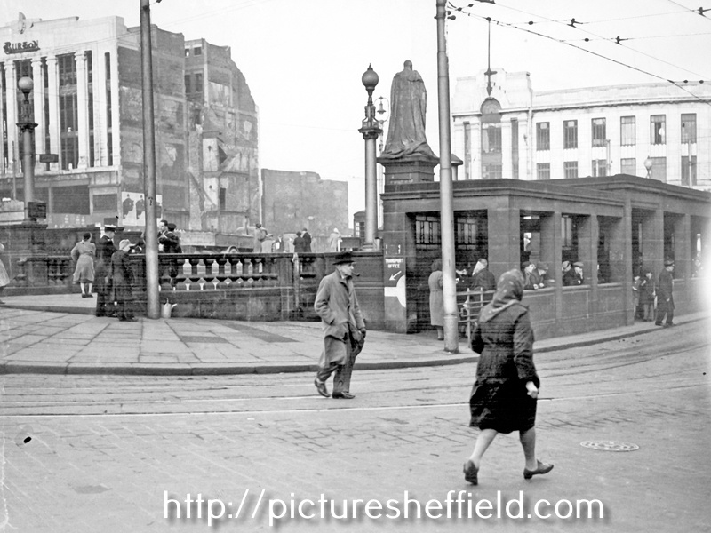Fitzalan Square looking towards High Street including Nos. 51 - 55 Burton Montague Ltd., tailors, Transport Offices, foreground