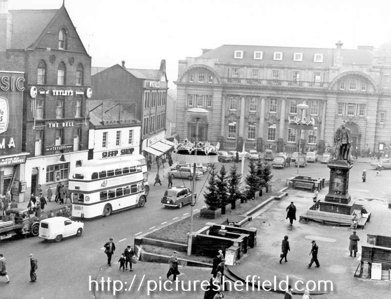 Fitzalan Square from High Street, Bell Hotel, No. 9 The Sleep Shop, bedding retailers, left, General Post Office, Baker's Hill, centre and King Edward VII Memorial, right