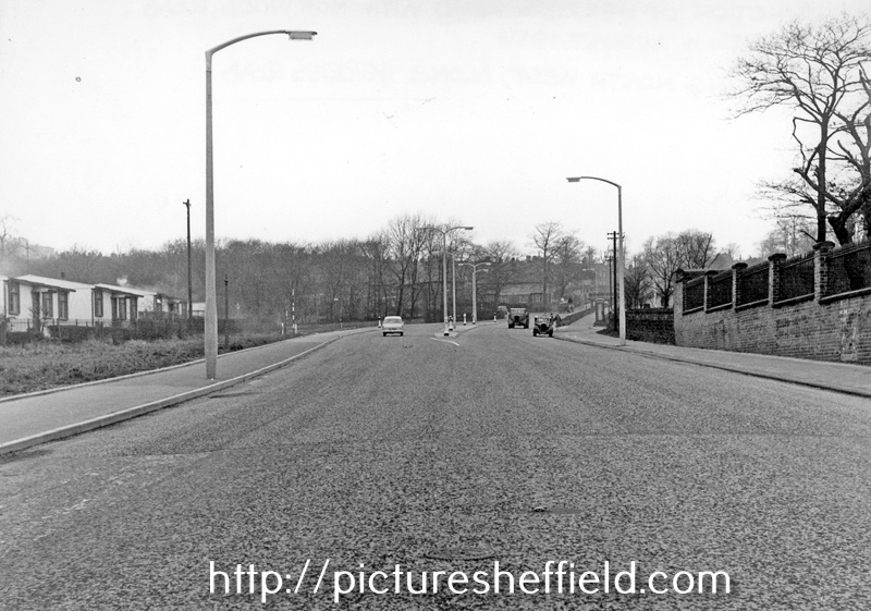 Looking north-west along Herries Road towards the junction with Norward Road grounds of the City General Hospital (later Northern General) on the right with prefab housing on the left