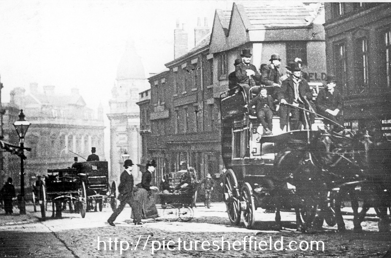 Horse drawn bus passing Market Place/High Street at corner with Change Alley, premises on right include Nos 78-80, former timber framed house, then occupied by John Wheeldon and Co, manufacturers of leather bands