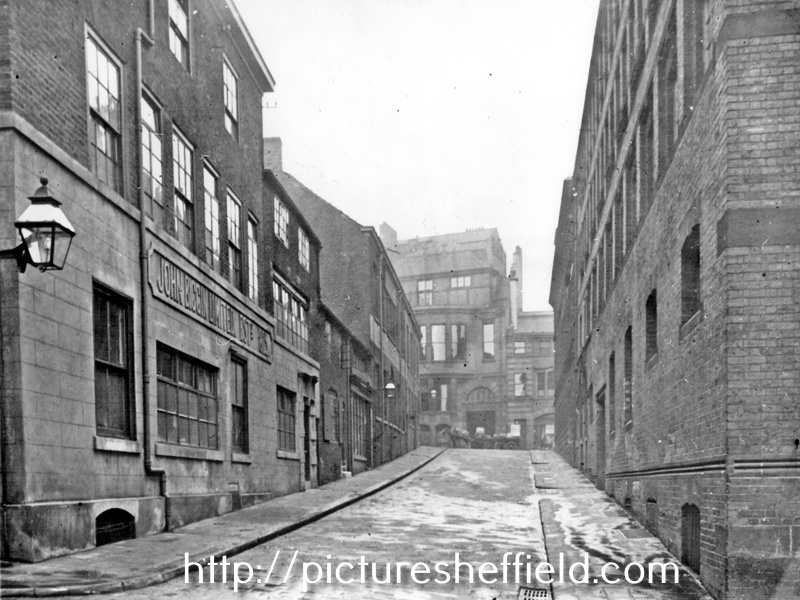 Milk Street from Sycamore Street looking towards Norfolk Street, No. 10 John Biggin Ltd., silver manufacturers, left, works belonging to Joseph Rodgers and Sons Ltd., cutlery manufacturers, right