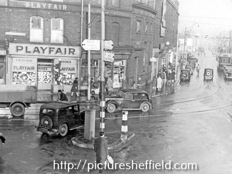 Traffic at The Moor and Ecclesall Road junction, premises include No. 2 Ecclesall Road, Henry Playfair Ltd., shoe shop, No. 206 The Moor, Yorkshire Bank Ltd., No. 210 S. Sawer, confectioners