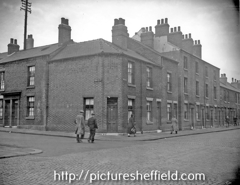 Moore Street at junction with Young Street, showing terraces and back to back houses. Court No. 4 at rear of back to backs.