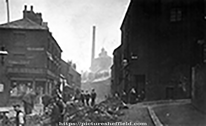 Pond Street at junction with Pond Hill, No. 64 John Young, hay and straw dealer, right, Nos. 63 and 65 William R. Storey, grocer, Pond Street Brewery in background