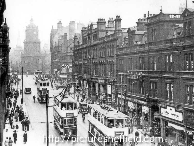 General view of Pinstone Street, premises on right include Empire Buildings, Nos 129-131, Richards and Co., Fancy Drapers, No 135, Barney Goodman, Tailor and Cambridge Arcade