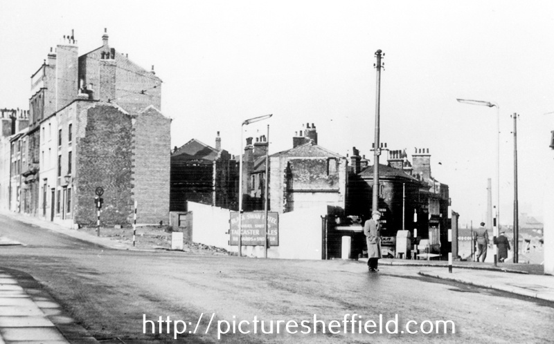 Snig Hill at junction with Bank Street, left, showing partial demolition of the Black Swan Hotel after the Blitz
