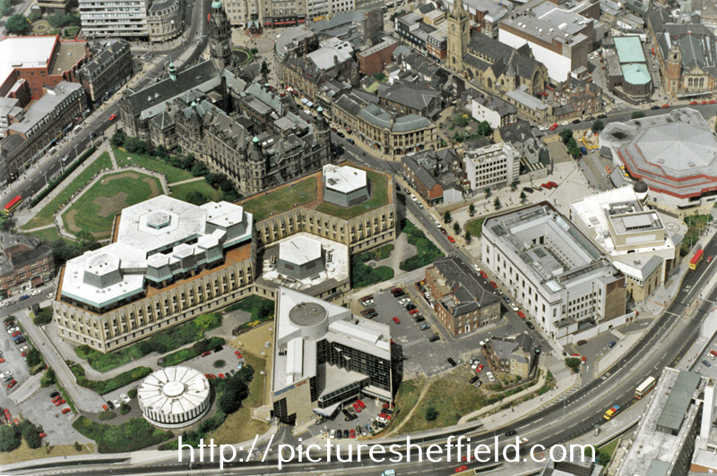 Aerial view of the City Centre, showing the Town Hall and extension, Register Office, Central Library, Novotel, Lyceum and Crucible Theatre. Arundel Gate, foreground. Surrey Street and Norfolk Street, centre. St. Marie's RC Church, top right.