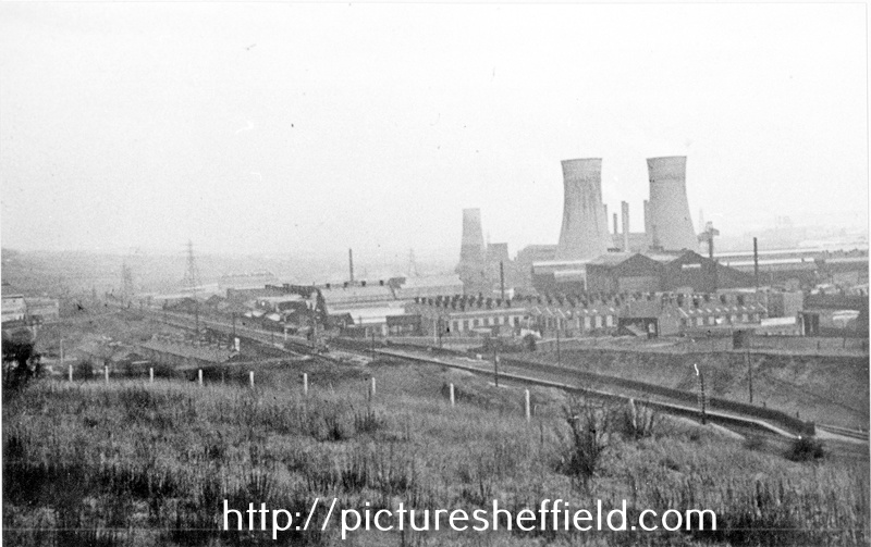 View from Wincobank Hill of Blackburn Meadows Power Station, the platforms of the derelict Wincobank and Meadowall Station and houses on Cromer Street (left) and Cromer Lane