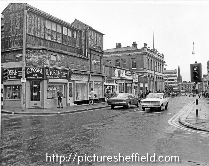 From the junction with Carver Street, Nos. 30 G. Yospa, jeweller; 26 - 28, Madame Marie (Milliners) Ltd.; 24, The Flower Kiosk; 22, Jeff's Curios and 20, J. Fantham, hairdressers, Division Street